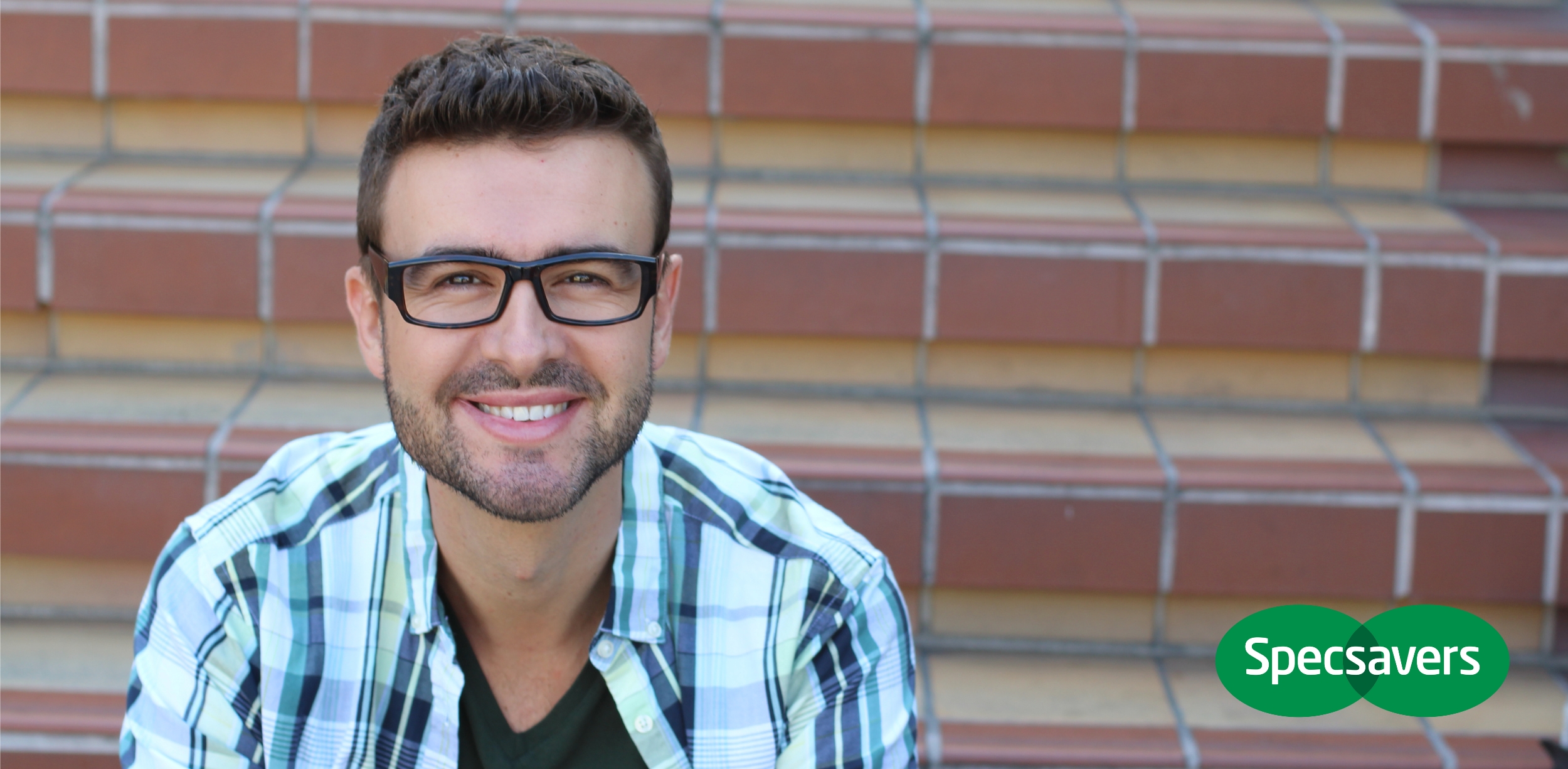 Man wearing glasses, Specsavers logos